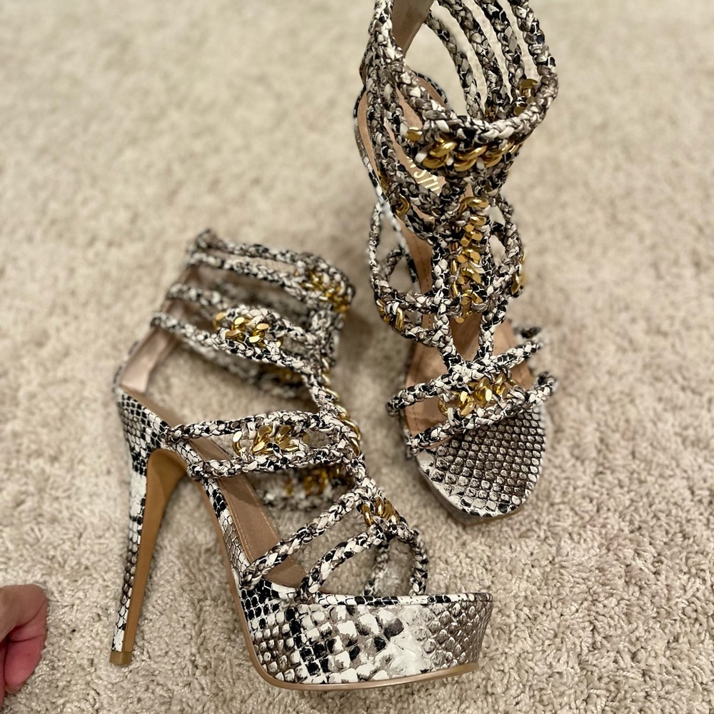 Leather snakeskin print platform heels with gold accents